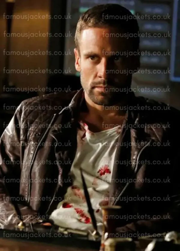 nick-blood-black-jacket.webp