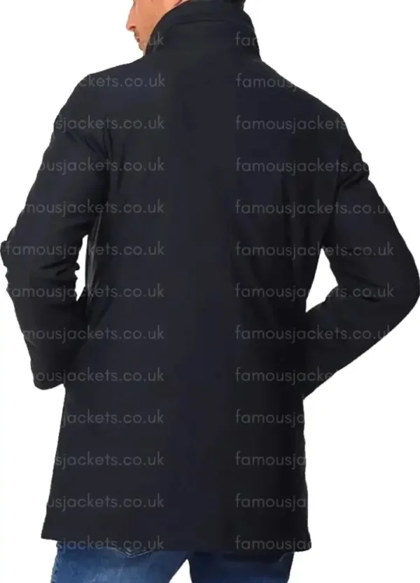 mikel-arteta-black-coat.webp