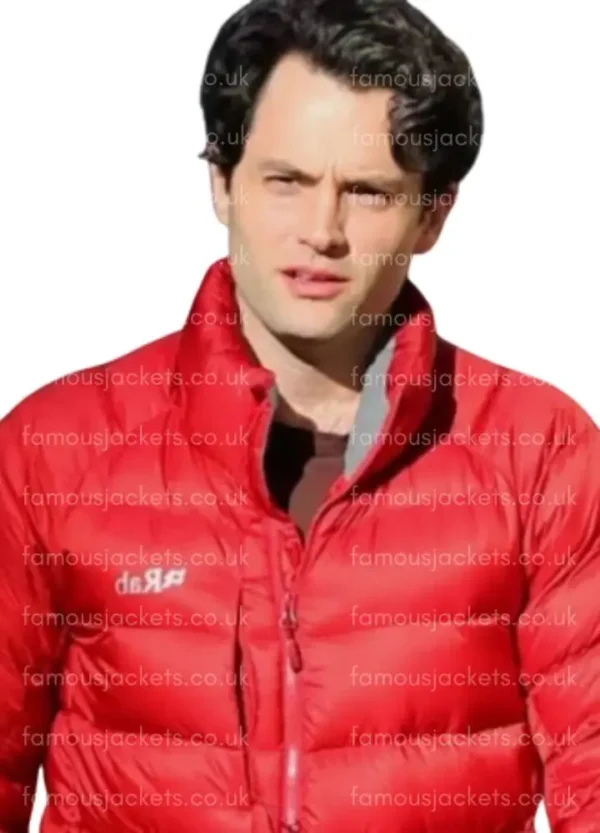 penn-badgley-red-puffer-jacket.webp