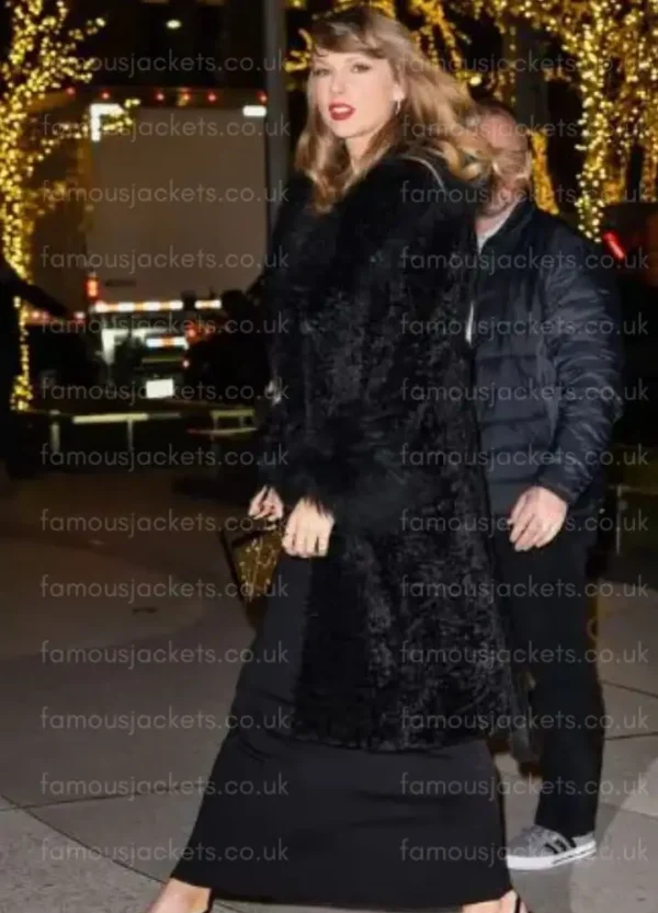 taylor-swift-black-coat.webp