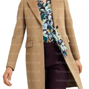 elizabeth-tulloch-tan-coat.webp