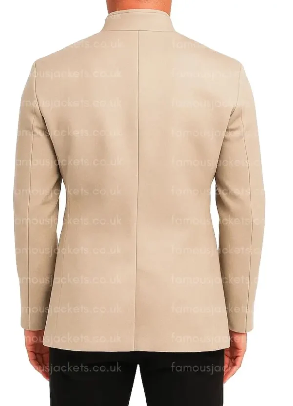 leon-prater-beige-coat.webp