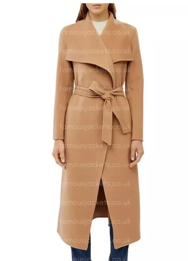 ruth-negga-brown-coat.webp